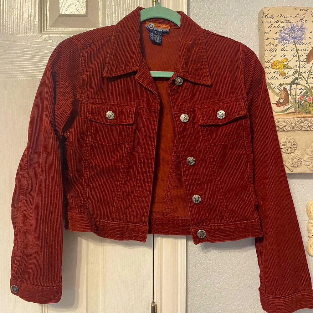 Red-brown corduroy jean jacket.